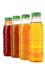 Bottles with juice isolated on white