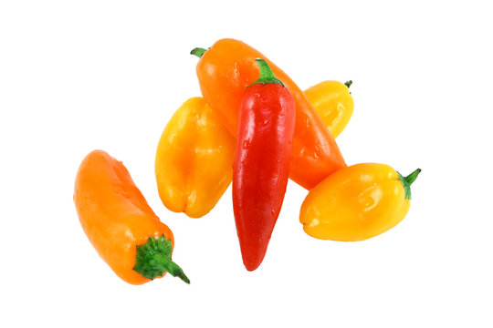 Assorted Miniature Sweet Peppers On A White Background
