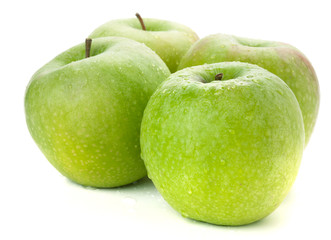 Four ripe green apples