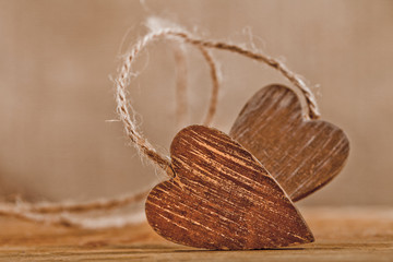 tied wooden hearts, free standing, shallow dof © Elena Moiseeva
