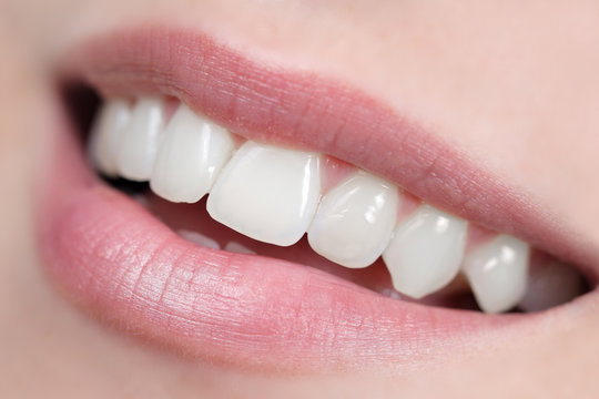 Close up of white, shiny and healthy smile