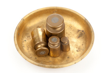 Four brass weigts