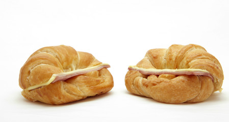 two Ham Cheese croissant on white