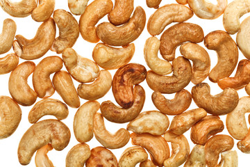 Unshelled roasted cashew nuts  food background