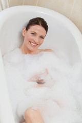 Beautiful woman taking a bath