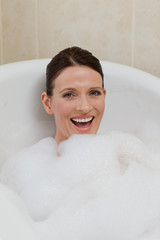 Beautiful woman taking a bath