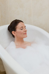 Beautiful woman taking a bath