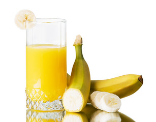 Fresh banana and fresh banana juice in a glass