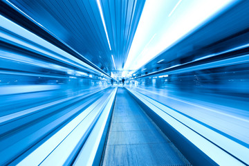 movement of abstract blue escalator with people