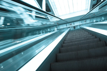Fototapeta premium blue modern escalator in business center
