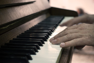 Hands and piano player