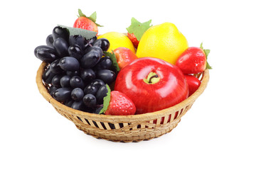 Fruit basket isolated on the white background