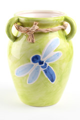 Green vase with dragonfly