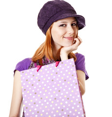 Shopping girl in violet with bag
