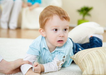 Fototapeta premium happy smiling and laughing boy at home