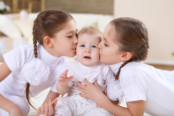 twin sisters together at home