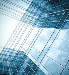modern blue glass skyscraper perspective view