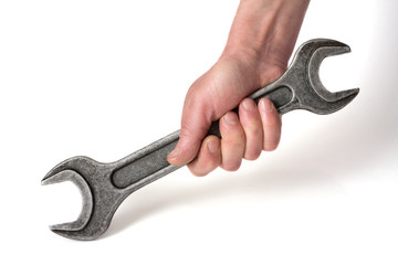 Spanner in a hand