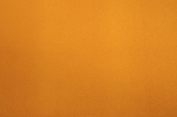 Texture of dense cardboard with yellow velvety  coating