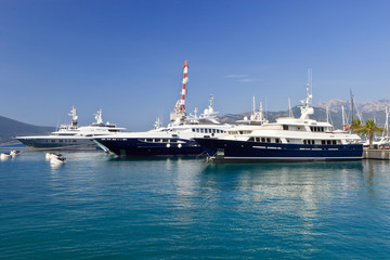 Three luxury yachts