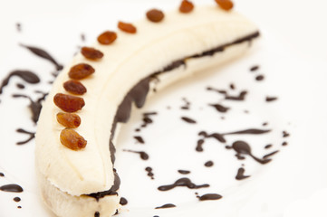 Banana topped with chocolate
