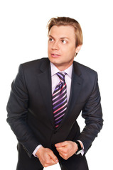 Frightened young businessman isolated on white wearing in formal