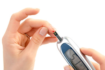 Diabetic patient measuring glucose level blood test
