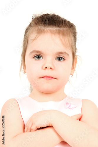Portrait of young girl in pink princess dress, studio shot