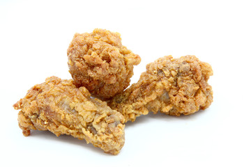 isolated three spicy deep fried chicken mini wing