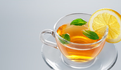 tea in cup with leaf mint