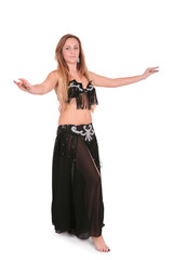 Naklejka premium Belly dancer performing with her hands up