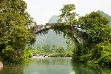 Gordijnen Ancient stone bridge © ping han