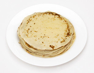 yellow pancakes on a white plate