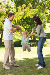 Joyful family in the park