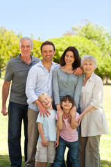 Obraz premium Family standing in the park