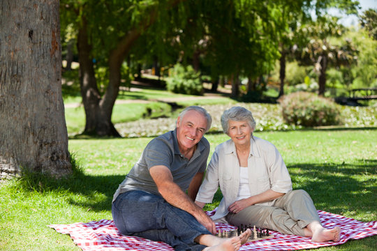 Senior couple  picnicking in the garden