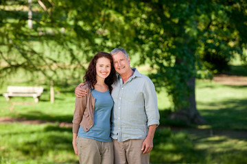 Fototapeta premium Father with his daughter looking at the camera