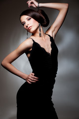 Fototapeta premium alluring woman in black dress