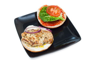 chicken burger with tomato, onion, lettuce isolated