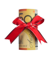 Fifty Australian dollars wrapped by ribbon isolated on white
