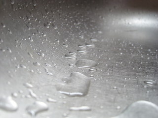 Water drops on an iron surface.