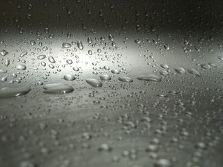 Water drops on an iron surface.