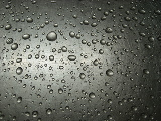 Water drops on an iron surface.