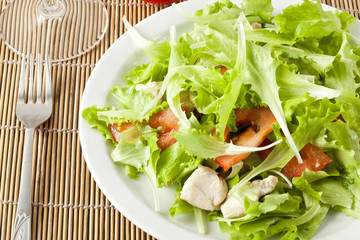 fresh salad with chicken and tomatoes