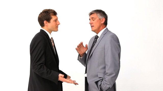 Businessman explaining something to his employee