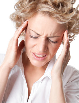Young woman with a painful headache