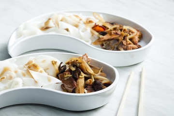 poultry meat with corn and shitake mushrooms