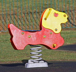 A Sprung Play Toy in a Childrens Playground Area.