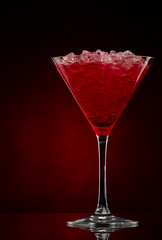 Cosmopolitan cocktail drink  on a red gradient