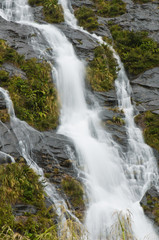 Fototapeta na wymiar Waterfall during rain showers